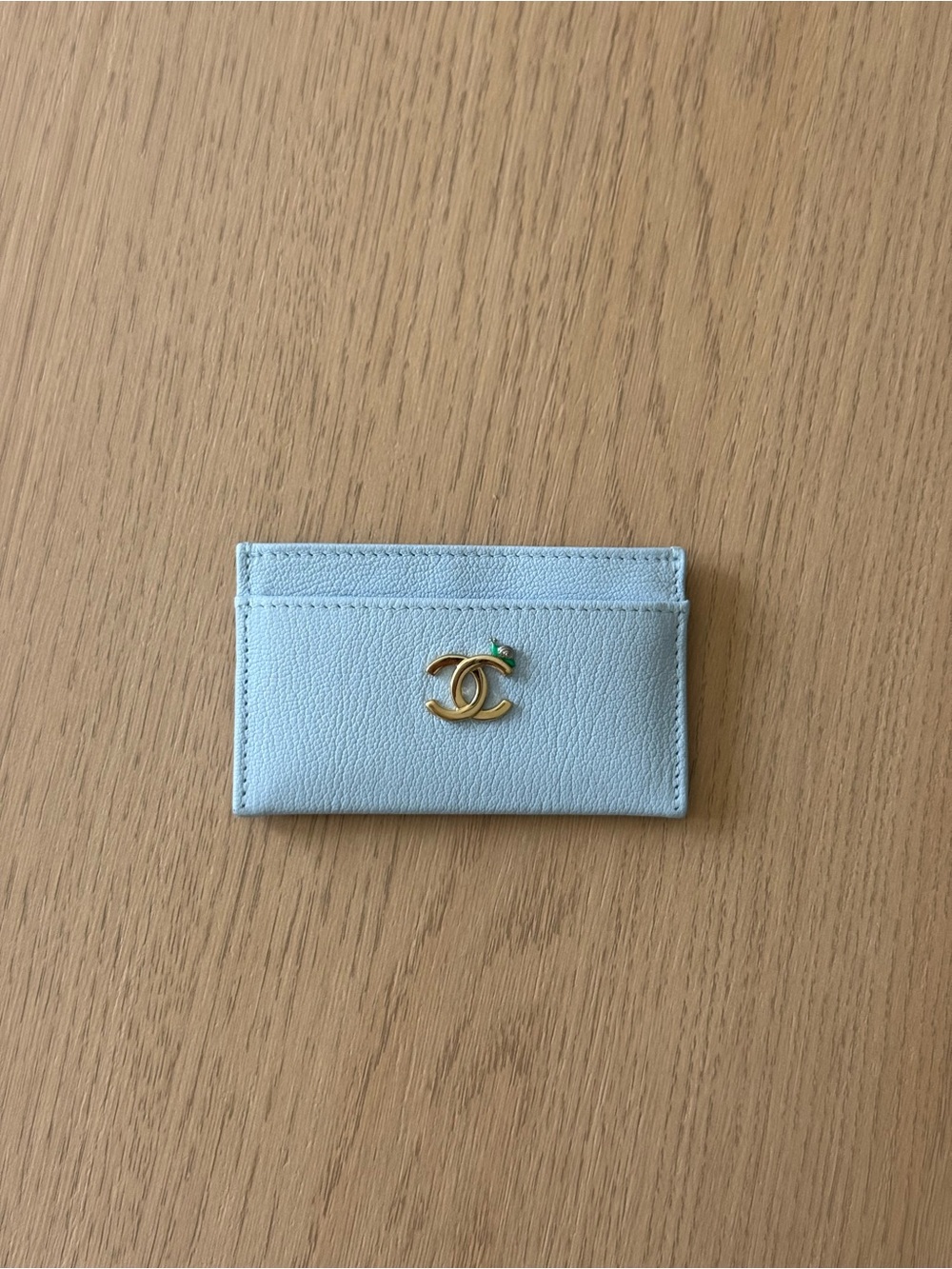 CHANEL Light Blue Card Holder with Gold CC Emblem
